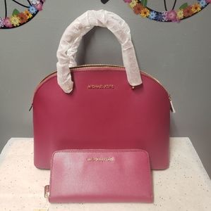 Michael Kors purse with matching wallet.